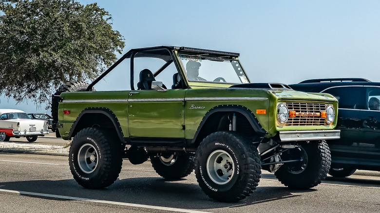 Green Ford Bronco in parkinglot