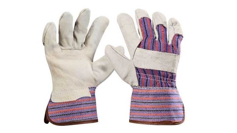 A pair of Harbor freight Tools split leather work gloves.