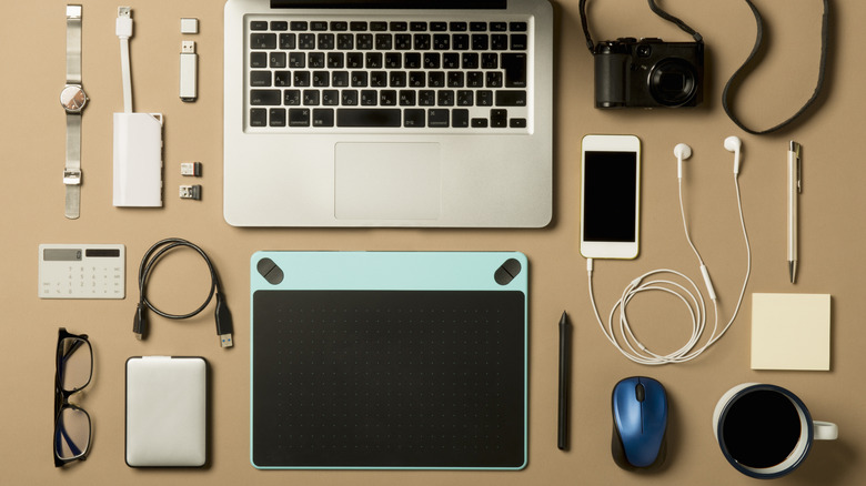 Various tech gadgets arranged on a table