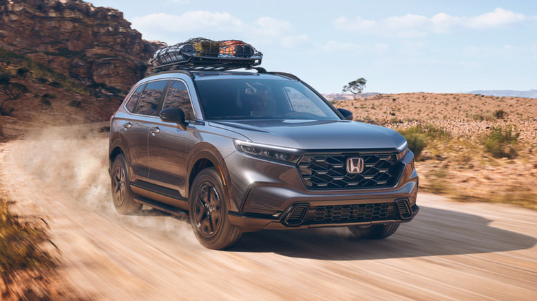 Honda CR-V Hybrid on dirt road