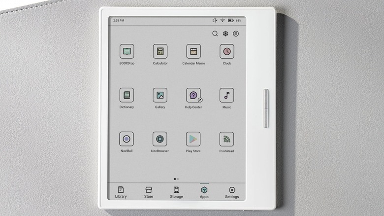 White e-reader device displaying apps on screen