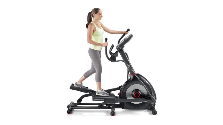 A woman exercising on the Schwinn 430