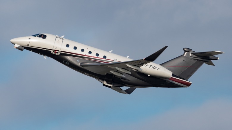 Embraer Preator 600 taking off from airport