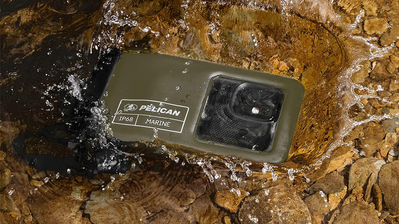smartphone in a Pelican waterproof pouch in a stream