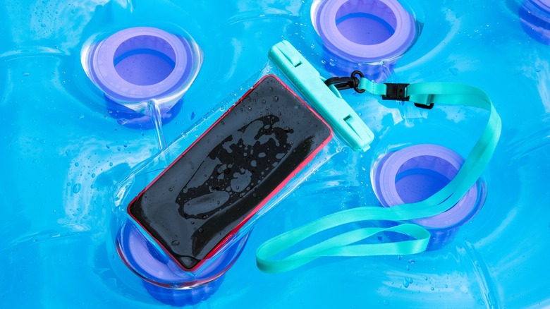 phone in a waterproof pouch floating in water