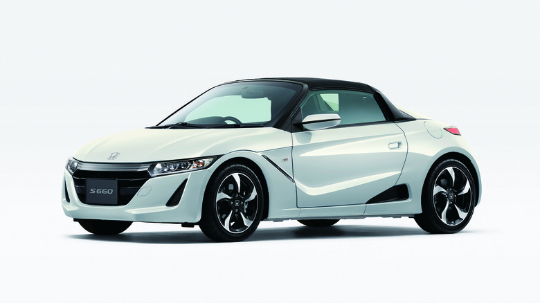 The Honda S660 in white, studio shot, front 3/4 view