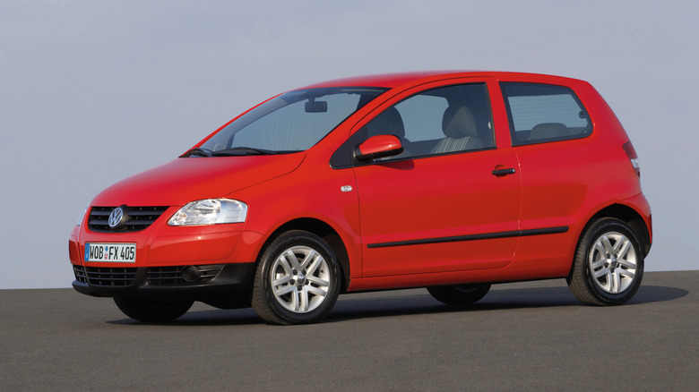 The Volkswagen Fox in red, front 3/4 view