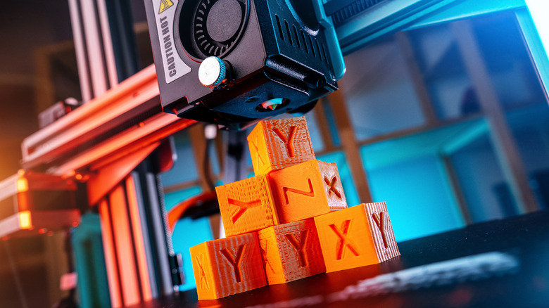 3D printer fabricating alphabet blocks