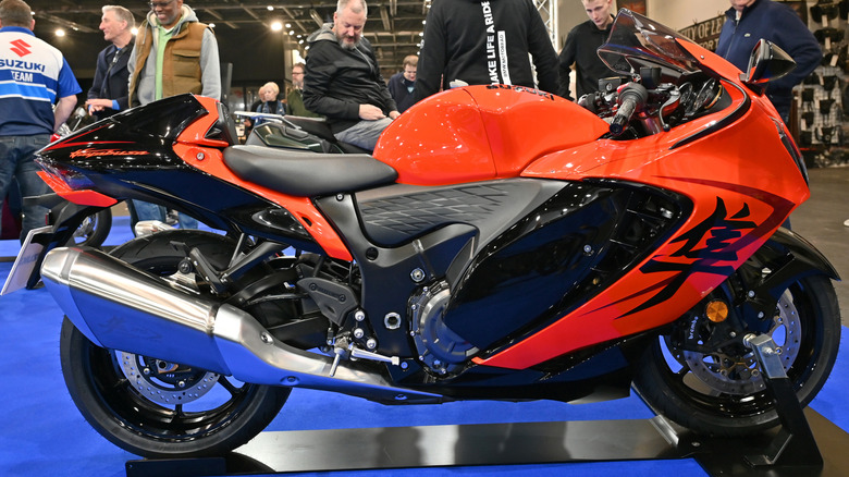 Orange and black Suzuki Hayabusa at motorcycle show