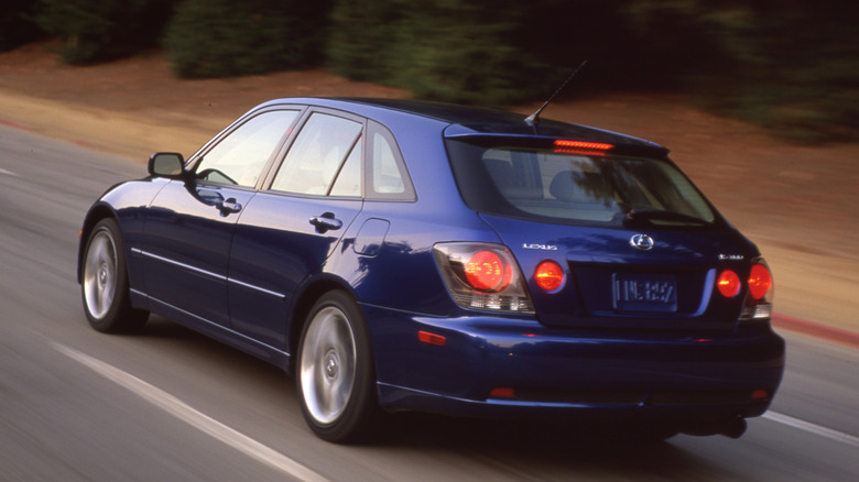 Lexus IS 300 SportCross driving at speed photo from behind 3/4 view