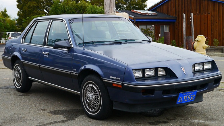 Blue 1984 Pontiac Sunbird Sedan