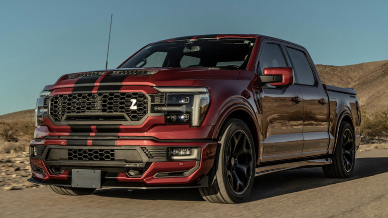 2024 Shelby F-150 Super Snake parked on road with hills in background