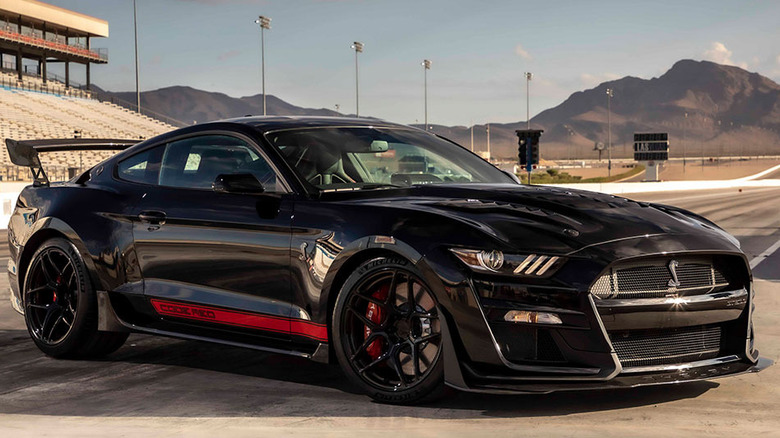 Mustang Shelby GT500 Code Red parked on racetrack