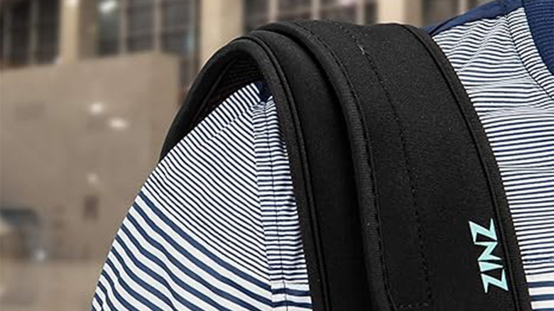 backpack strap with a shoulder cushion under it