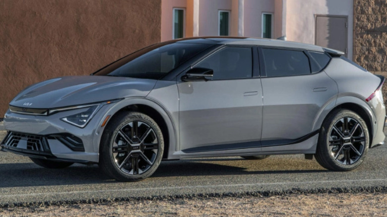 2025 Kia EV6 parked on a road in front of a building