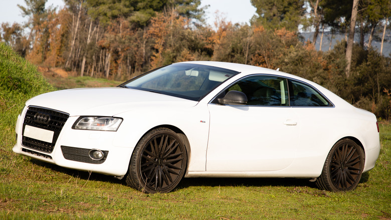 White audi A5 IN FIELD