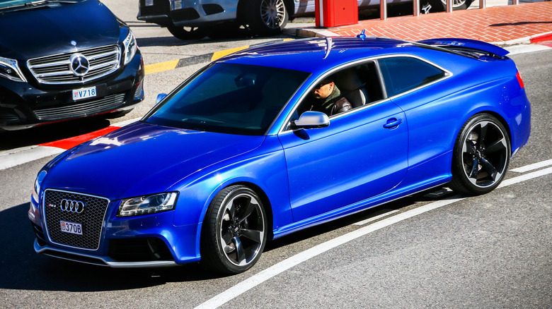 Blue Audi RS 5 in parking lot