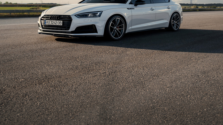 White Audi S5 on highway