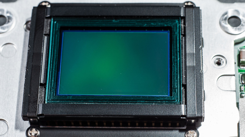 A camera sensor opened for cleaning.