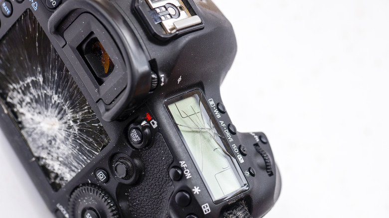 A DSLR camera with an irreversibly damaged screen.