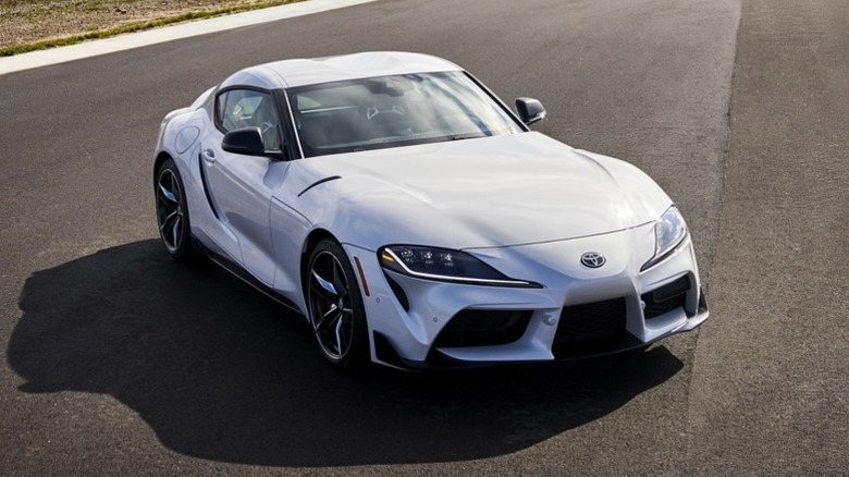 White 2021 GR Supra 3.0 Premium parked on a track