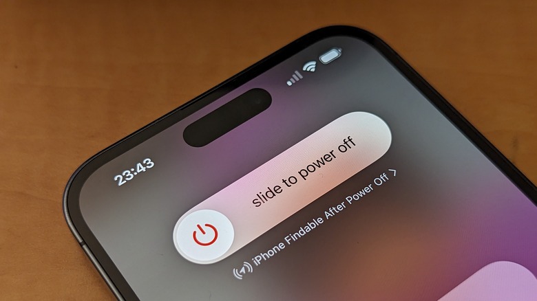 iPhone showing Slide to Power Off control.