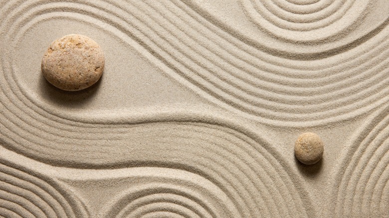 Raked and smoothed sand in a Zen Garden.