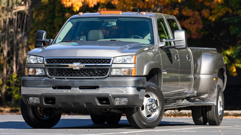 А 2006 Chevrolet Silverado 3500 HD in gray, front 3/4 view