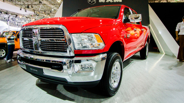 The 2016 RAM 2500 in red at an auto show, front 3/4 view