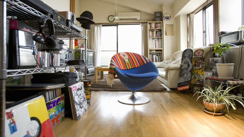 Man cave with audio equipment and skateboards