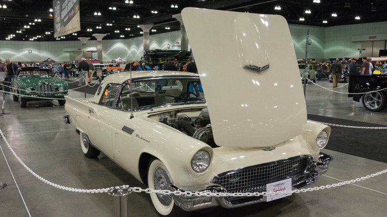 White Supercharged Ford Thunderbird at car show