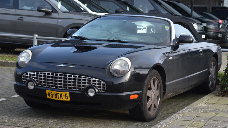 Black 2005 Ford Thunderbird in parking lot