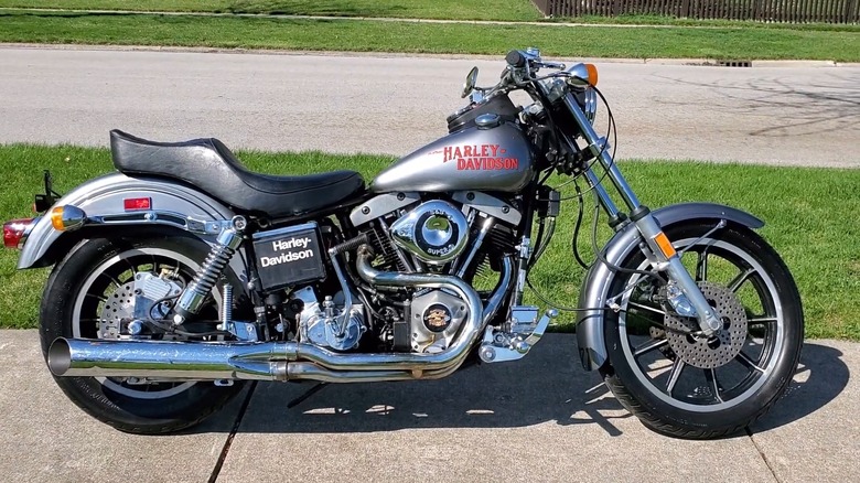 A 1970 Harley-Davidson Low Rider parked on a road