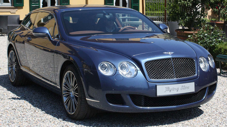 The Bentley Continental Flying Star in dark blue, front 3/4 view