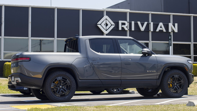 A Rivian R1T in a parking space