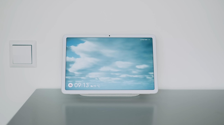 Google Pixel Tablet mounted on the dock and resting on a table