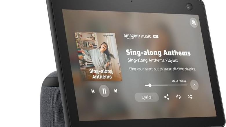 Echo Show 10 with music playing on it and album art on the screen