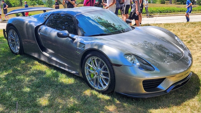 Porsche 918 Spyder parked on grass