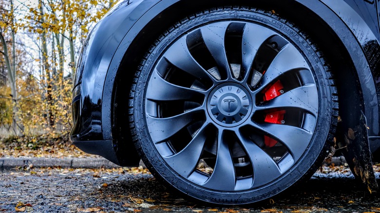 tesla front wheel on asphalt