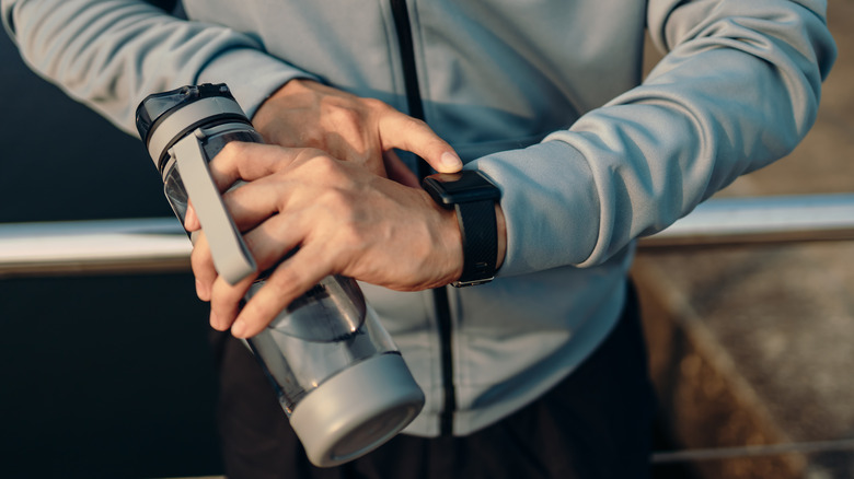 Person using smartwatch