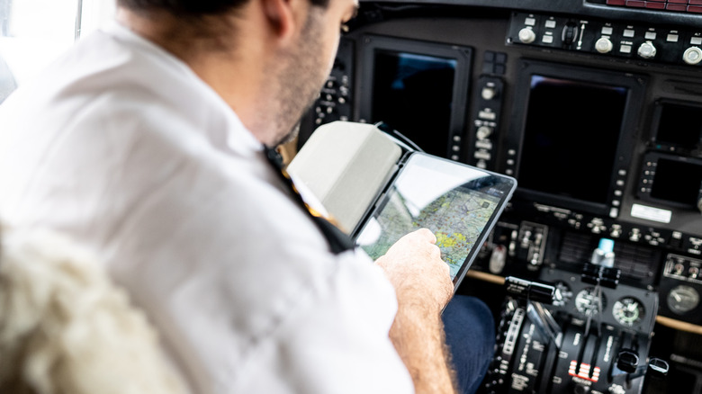 Pilot using a tablet