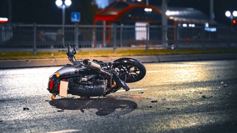 Motorcycle laying on road