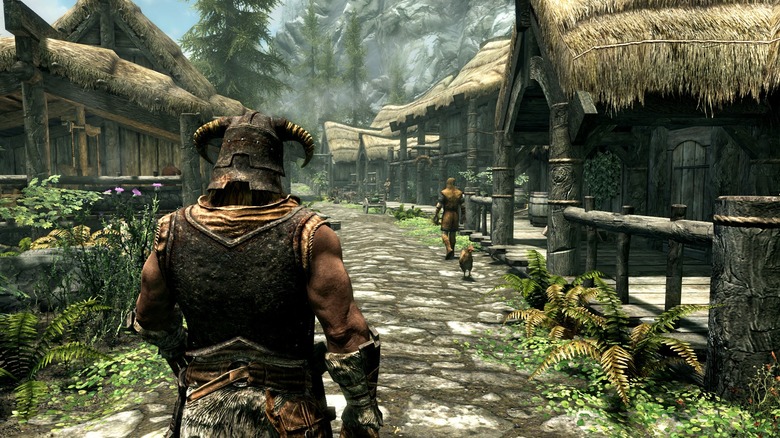 A dragonborn walking through town in Elder Scrolls Skyrim Special Edition