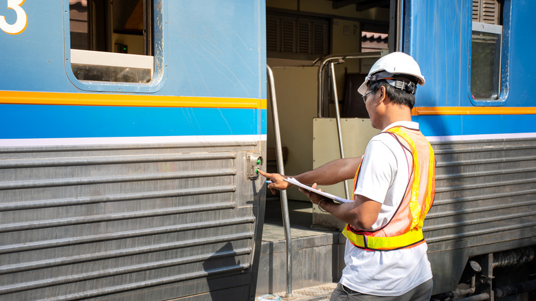 Engineer looking at Fuxing train