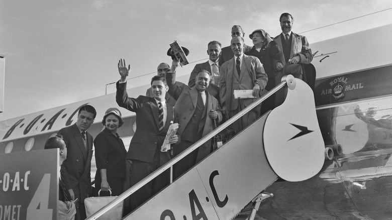 Passengers entering Comet 4 airliner