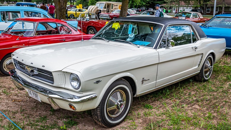 White 1965 Ford Mustang with black hardtop