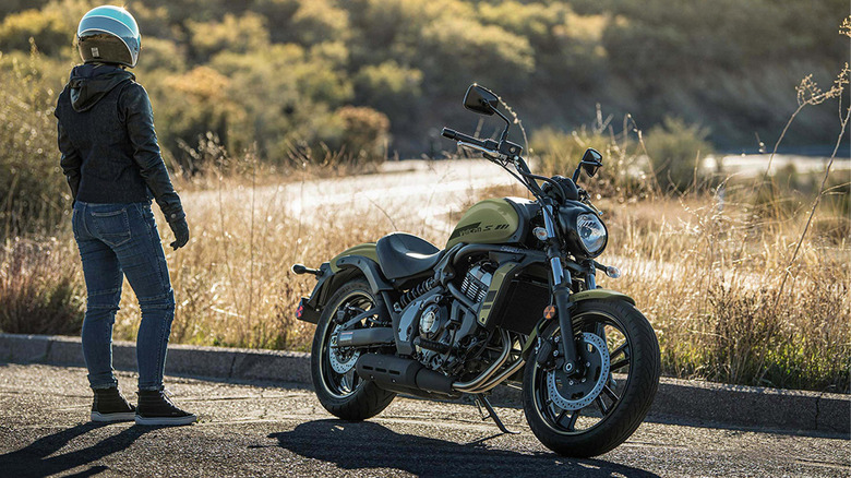 Person standing by parked Vulcan S