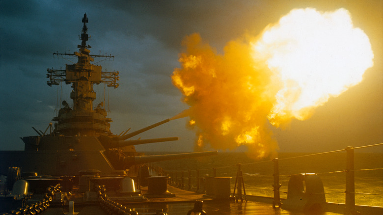Battleship guns firing at night