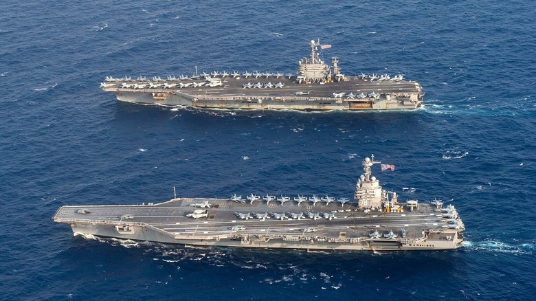 USS Gerald R. Ford in front of the USS Harry S. Truman