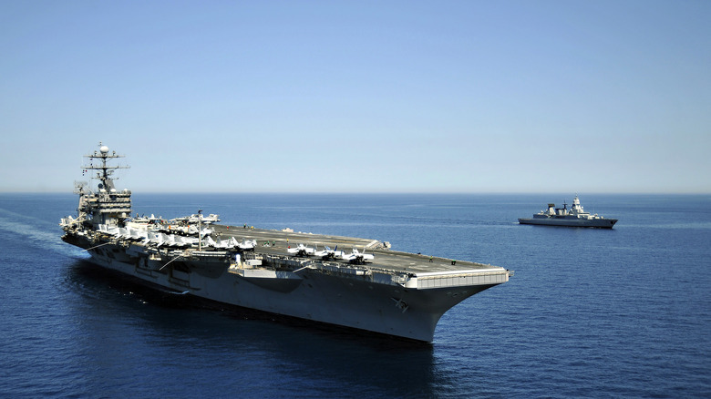 USS Harry S. Truman alongside German boat